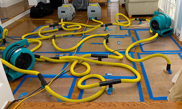Professional Storm Water Damage Restoration technician working in Prineville, OR